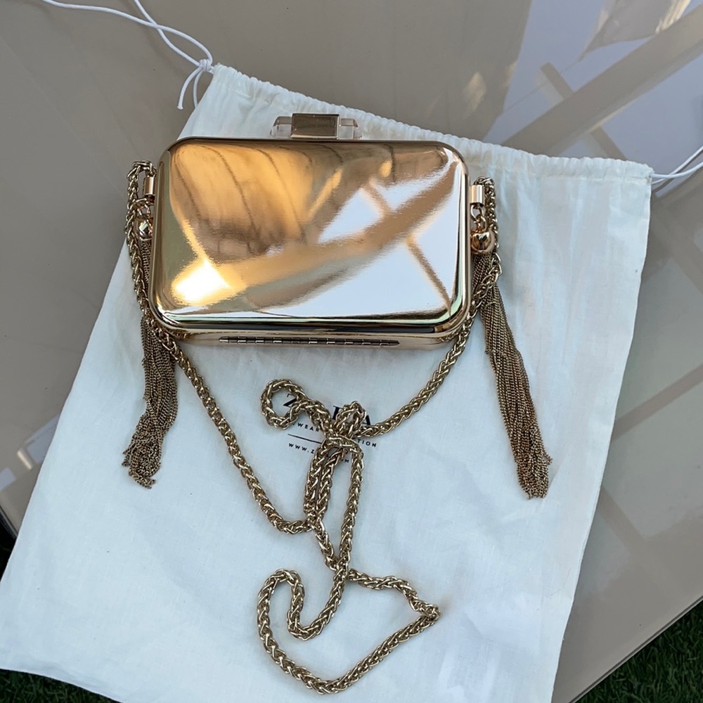 NWOT Zara gold hard shell clutch chain strap with tassels